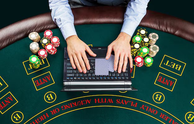 casino-online-gambling-technology-people-concept-close-up-poker-player-with-playing-cards-laptop-chi